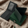 Two wallet black and green is shown in picture.